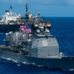 US escorts commercial ship through Hormuz by March 31?