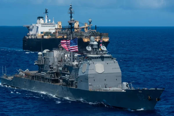 US escorts commercial ship through Hormuz by March 31?